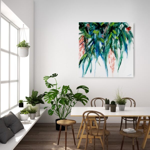 Spring Blossoms - This abstract mixed media artwork represents exotic red / pink flowers dropping down amongst lush foliage. The luscious bunches of flowers are in full bloom and the light is shining through the foliage. The painting represents the beauty of summer flowers blossoming and conveys a sense of serenity and beauty. The painting is hanging on a pale wall behind tables and chairs plus decorating items.