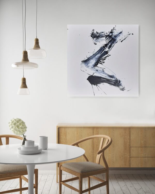 Rising to the Light - Zen art abstract black and white painting depicting movement in bold Asian style brushstrokes. The painting is hanging on a dining room room wall with table and chairs.