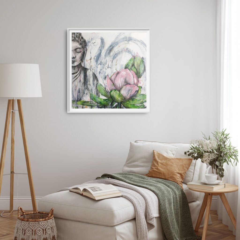 Buddha Heart - This mixed media artwork is an abstract representation of a female Buddha. In the foreground is a pink lotus flower as a symbol of transformation and enlightenment. There are various materials used to create the Asian calligraphy and bold brushstrokes in the background composition. The painting is hanging on a white wall with a chaise lounge, small table and tall lamp as decoration.