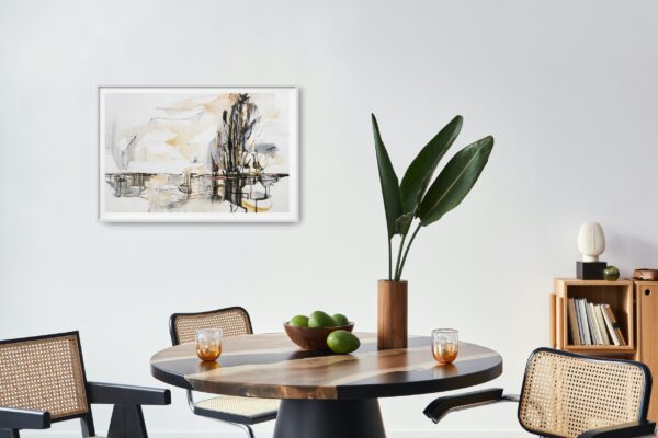 Elements of Nature - This abstract mixed media artwork portrays an estuary or lake with reflection of ochre, rich copper and black trees amidst a cloudy sky. The painting is hanging on a white wall in front of tables and chairs with decorating items.