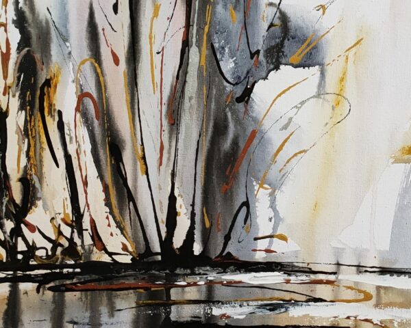 Mist on the Lake - Detail of an abstract mixed media artwork portrays an estuary or lake with reflection of ochre, rich copper and black trees amidst a cloudy sky. The painting is hanging on a white wall in front of tables and chairs with decorating items.