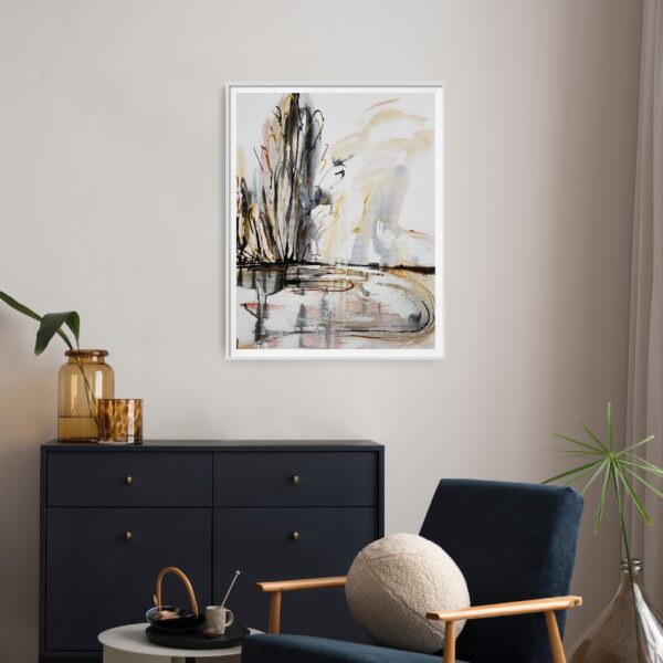 Mist on the Lake - This abstract mixed media artwork portrays an estuary or lake with reflection of ochre, rich copper and black trees amidst a cloudy sky. The painting is hanging on a white wall in front of tables and chairs with decorating items. The painting is hanging on a pale wall behind a cabinet, chair and decorating items.