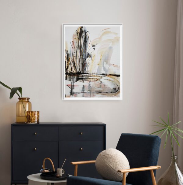 Mist on the Lake - This abstract mixed media artwork portrays an estuary or lake with reflection of ochre, rich copper and black trees amidst a cloudy sky. The painting is hanging on a white wall in front of tables and chairs with decorating items. The painting is hanging on a pale wall behind a cabinet, chair and decorating items.