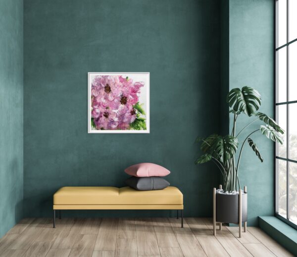 Opulent Pink - A mixed media painting portraying large, vibrant, and opulent pink flowers amongst green leaves in the background. The painting is hanging on a jade wall with a seat in front and a pot plant to the right-hand side.