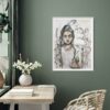 Peace Within - original artwork of a peaceful female Buddha meditating in pale neutral colours with a pink and green lotus flower hanging on a green wall in front of a white desk and chair. On the desk is a vase of flowers, mala beads and some books. In the window is a lamp and plant.