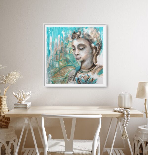 Turquoise Devotion - An original artwork showing a female Buddha meditating. In the foreground is a turquoise lotus flower and in the background is a turquoise and ochre mandala pattern. The words love, peace and joy are written in the front. The painting is hanging on a cream wall with a wooden desk and white chair in front.