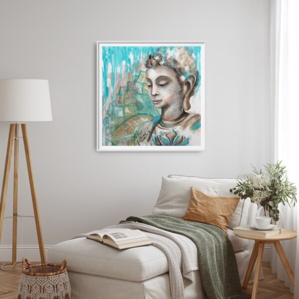 Turquoise Devotion - An original artwork showing a female Buddha meditating. In the foreground is a turquoise lotus flower and in the background is a turquoise and ochre mandala pattern. The words love, peace and joy are written in the front. The painting is hanging on a cream wall with chaise lounge in front, a small table with a vase of flowers and book cups to the side and a standing lamp on the other side.