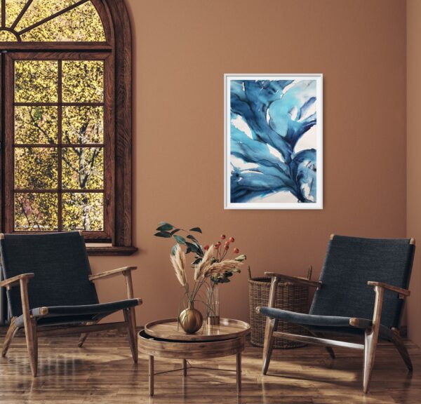 Bright blue and turquoise abstract artwork of waving underwater plants hanging on an ochre wall above two seats with table, a plant, and window to the side.