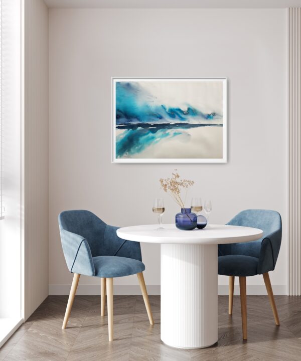 Bright blue and turquoise abstract seascape artwork hanging on a wall above a table and chairs.