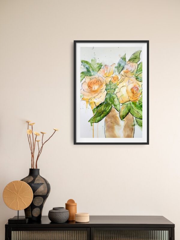 Beautiful original abstract mixed media artwork of pale apricot roses hanging on a wall above a cabinet and decorating items