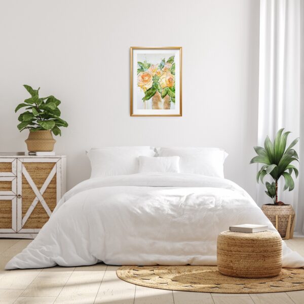 Original abstract painting of pale apricot roses in a vase hanging on a beige wall above a bed and side tables