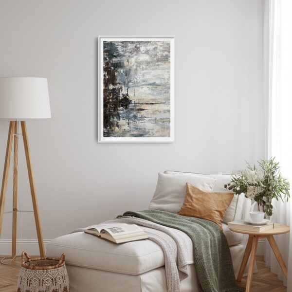 Abstract painting of a stormy sky and lake with trees to the side hanging over a chaise lounge with a side table and lamp